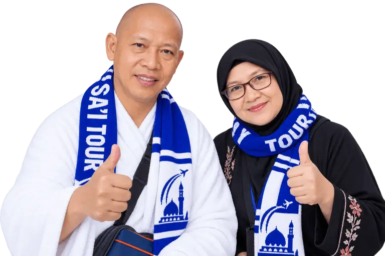 Pasangan Jamaah Haji mengacungkan jempol